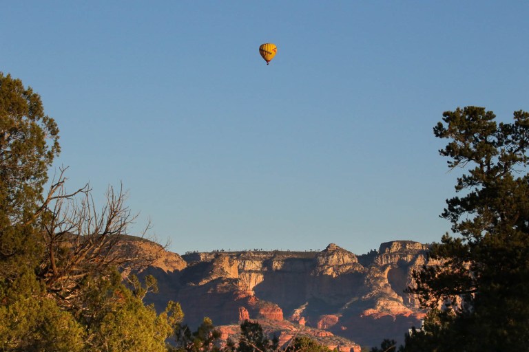 Hot air balloon over Sedona sunrise